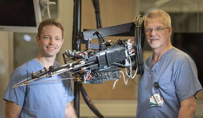 Hand-held robot points to less invasive prostate surgery